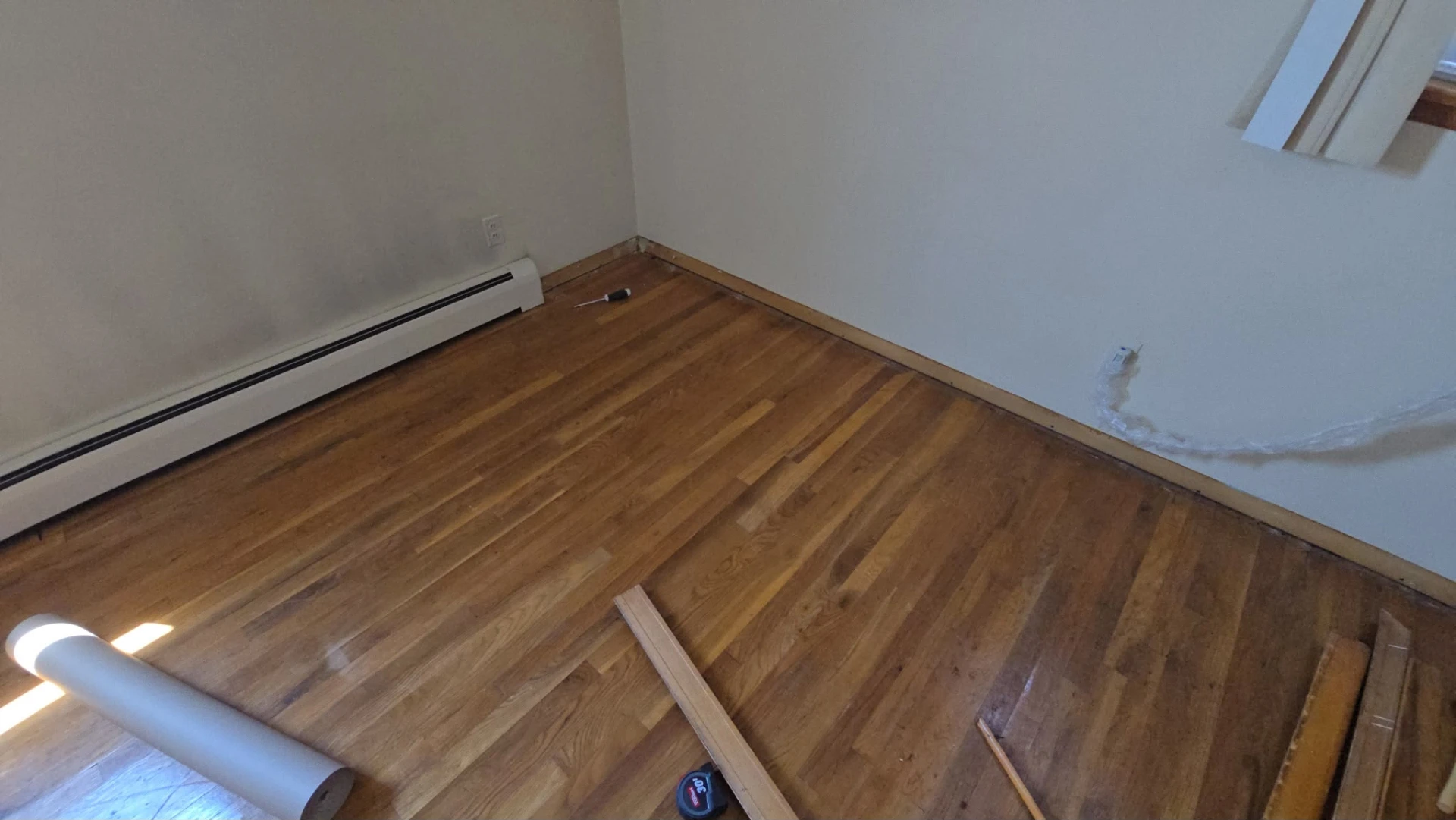 Original hardwood floor before renovation