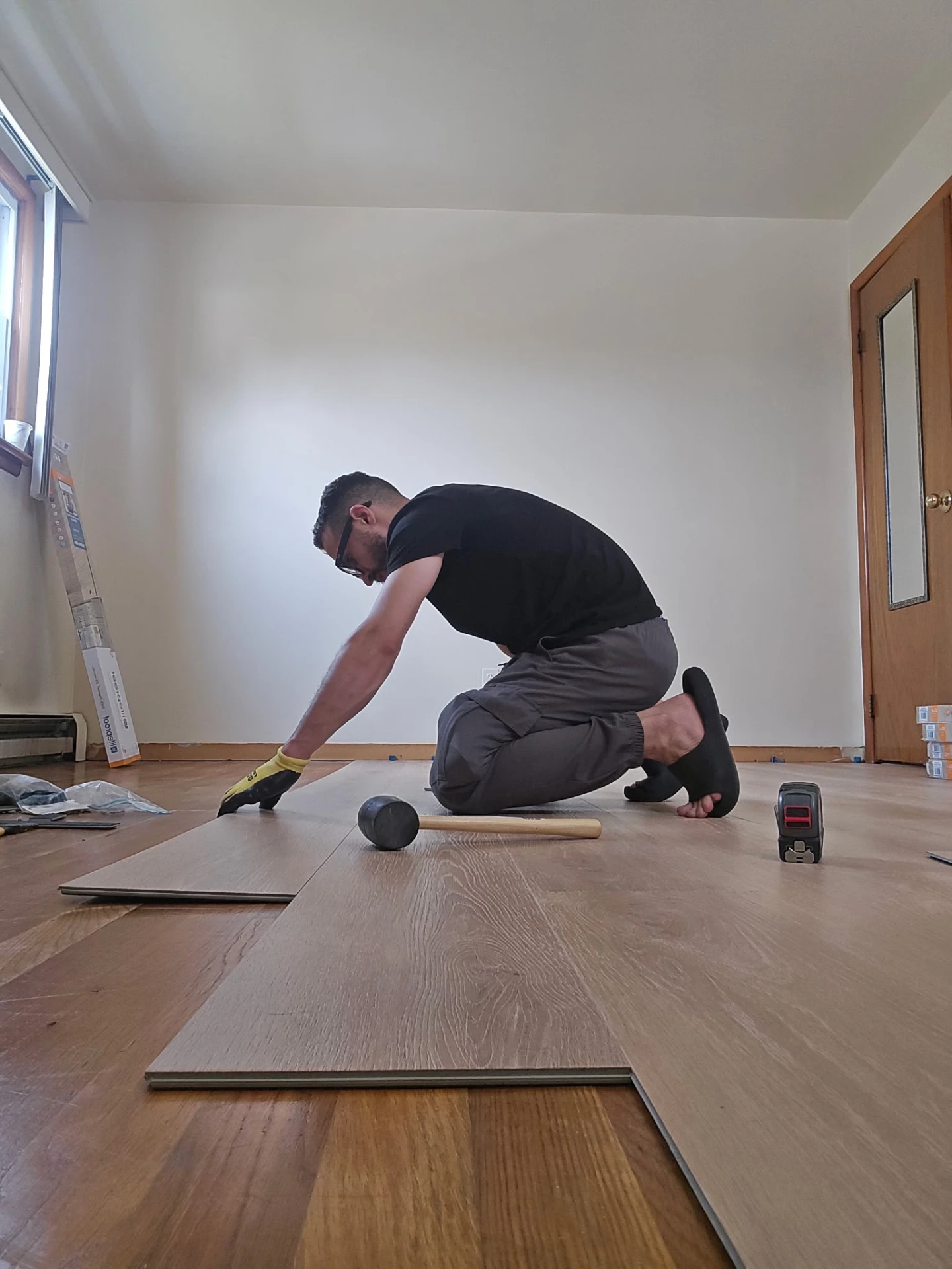 HandyPrime installing new vinyl plank flooring